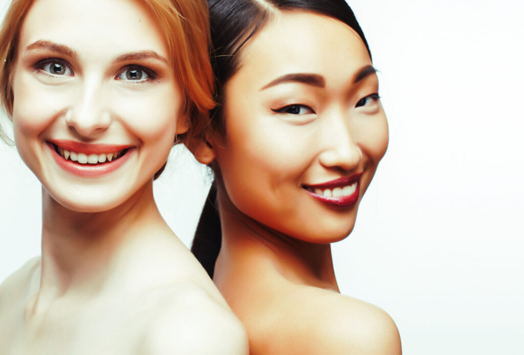 different nation woman: african-american, caucasian, asian together isolated on white background happy smiling, diverse type on skin, lifestyle people concept different nation woman: african-american, caucasian, asian together isolated on white background happy smiling, diverse type on skin, lifestyle people concept